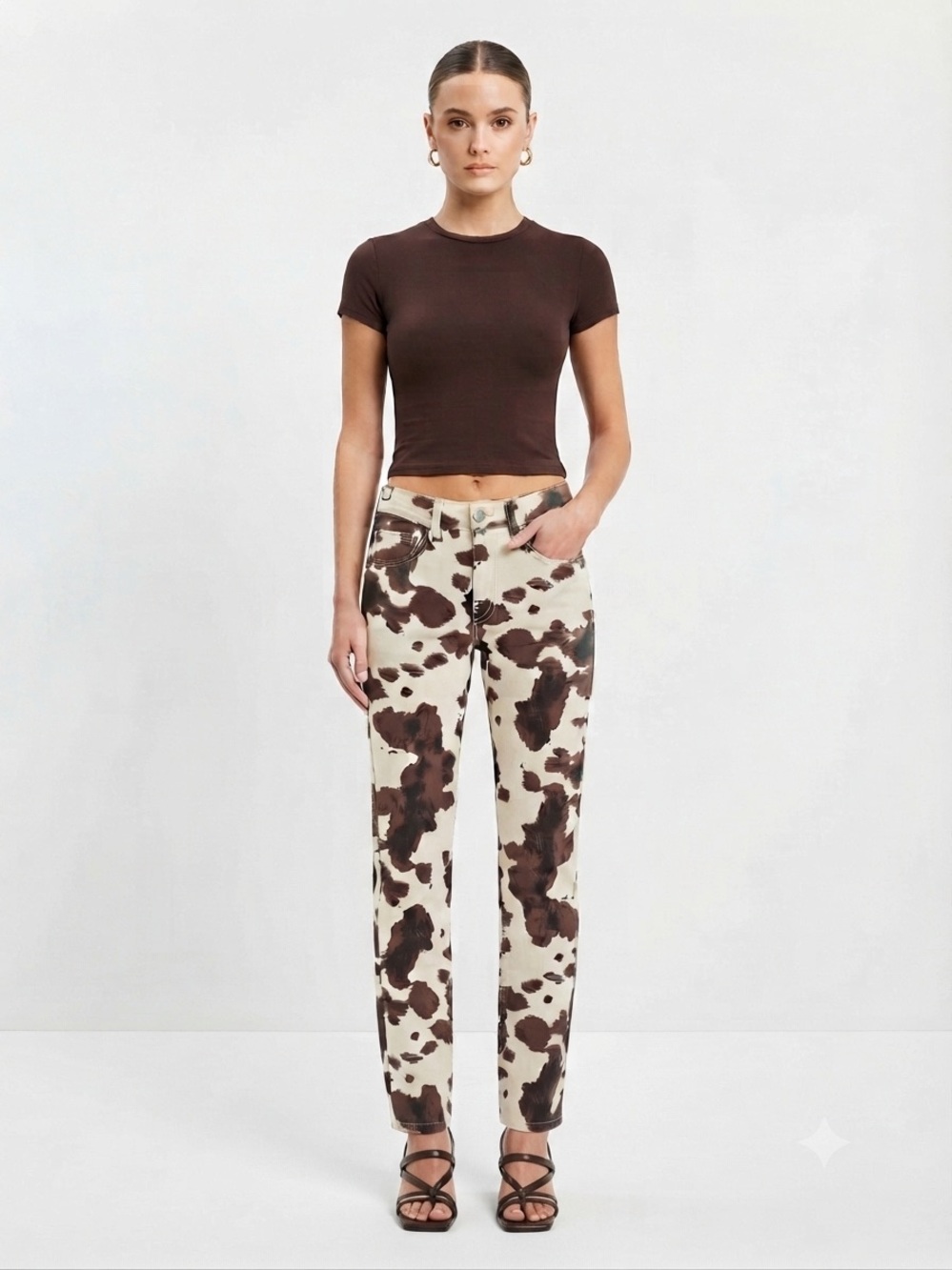 Oat Cow Print Mid Rise Slim Fit Jeans in Brown and Cream
